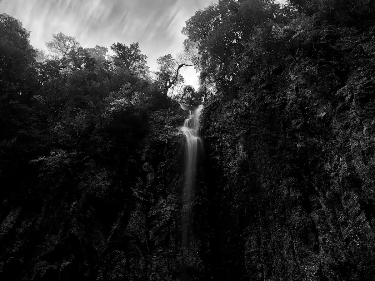 Black and white photo of a waterfall in Tottori, Japan