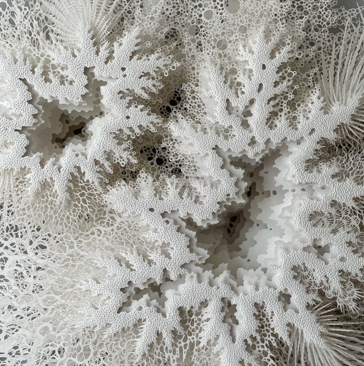 Intricate paper sculptures by Rogan Brown