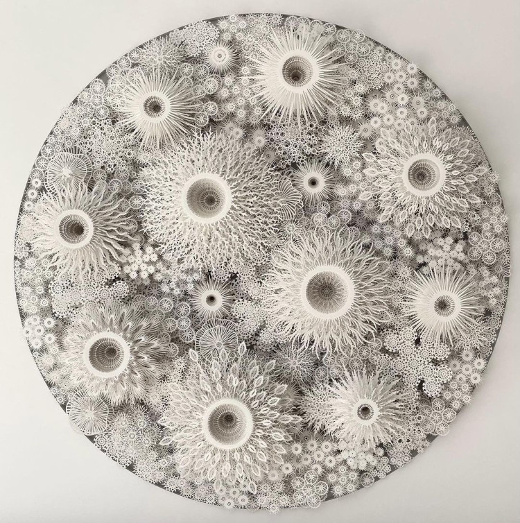 Intricate paper sculptures by Rogan Brown